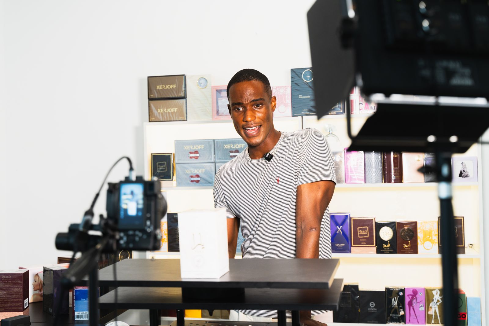 A creator filming in a filming room