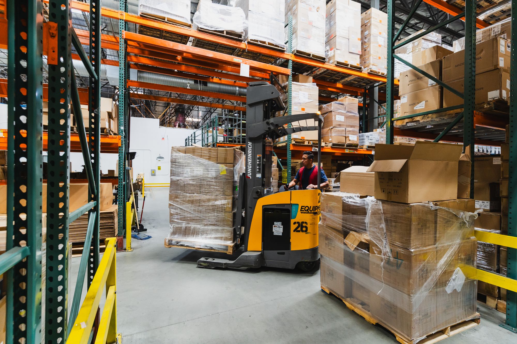 Pallet racks stocked with product in the warehouse
